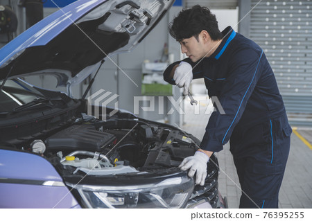 auto vehicle Service repair center concept with maintenance staff 76395255