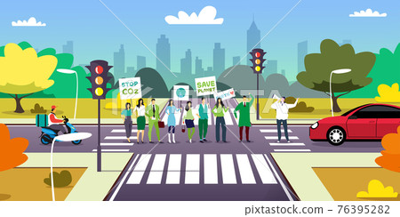 environmental activists on crossroad holding posters go green save planet concept protesters campaigning to protect earth demonstrating against global warming cityscape full length horizontal environmental activists on crossroad holding posters go green save planet concept protesters campaigning to protect earth demonstrating against global warming cityscape full length horizontal 76395282