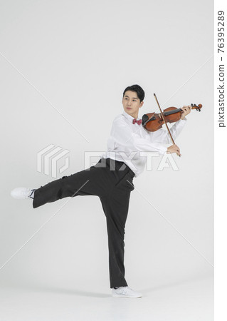 Asian female contemporary dancer with violin Asian female contemporary dancer with violin 76395289