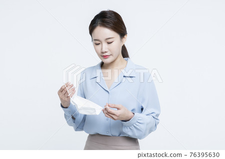 Asian woman business concept with mask 76395630