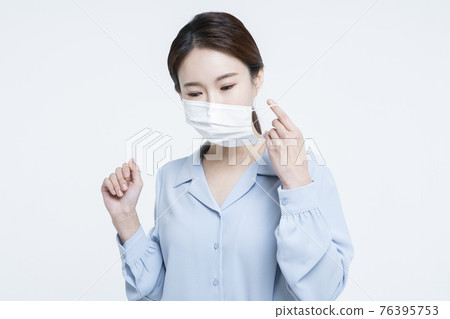 Asian woman business concept with mask 76395753