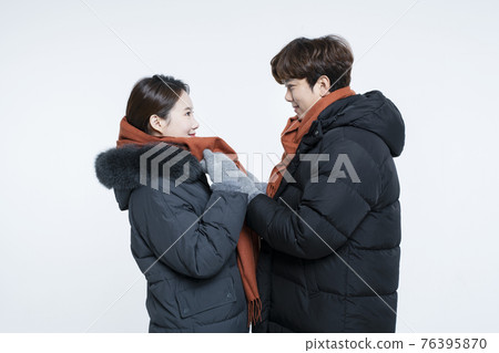 Asian couple in winter fashion 76395870