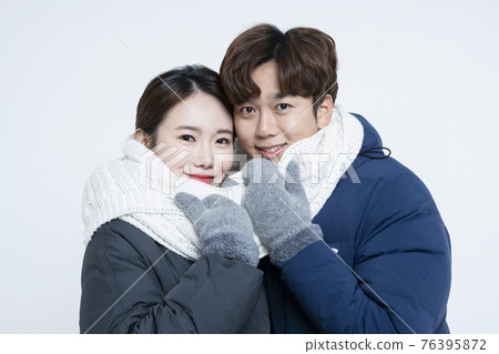 Asian couple in winter fashion 76395872
