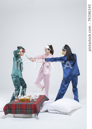girls, ladies pajama sleepoverparty concept 76396345