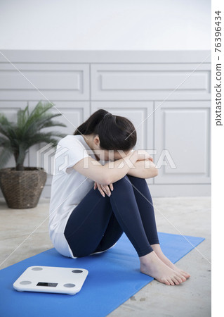 woman on diet, home training and work out concept woman on diet, home training and work out concept 76396434