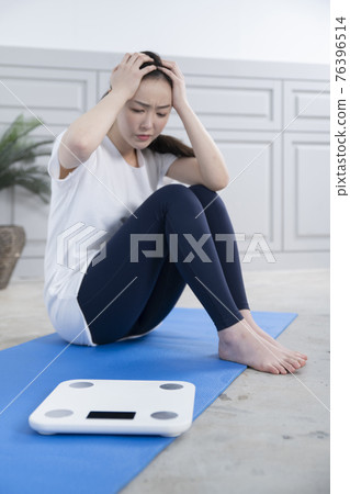 woman on diet, home training and work out concept woman on diet, home training and work out concept 76396514