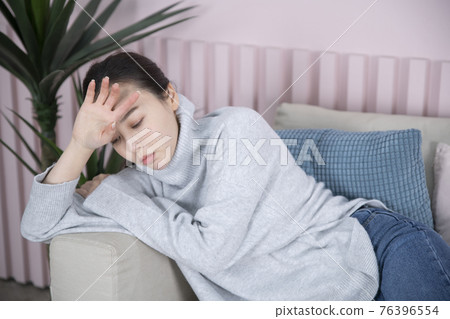 sick woman in pain concept sick woman in pain concept 76396554