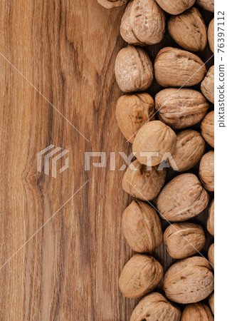 background of walnuts background of walnuts 76397112