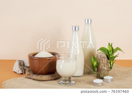 rice wine in glass bottles 76397460