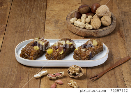 Yakbap, Korean dessert flavored glutinous rice mixed with honey, dates, chestnuts 76397552