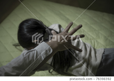 depressed Asian child in fear due to child abuse and violence, Human Rights Day concept depressed Asian child in fear due to child abuse and violence, Human Rights Day concept 76398392