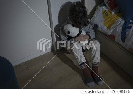 depressed Asian child in fear due to child abuse and violence, Human Rights Day concept depressed Asian child in fear due to child abuse and violence, Human Rights Day concept 76398456