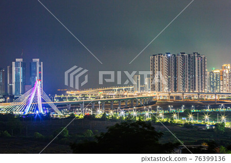 skyscape filled with buildings, apartments in Korea 76399136