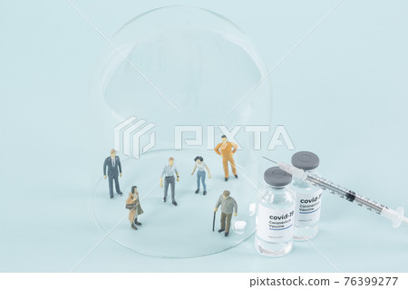 vaccine, syringe and person figuring 76399277
