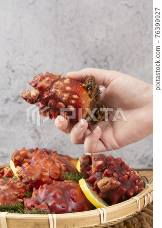 sea squirt on hand sea squirt on hand 76399927