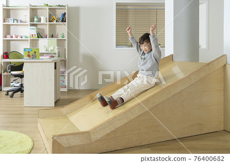 Asian little girl on slide Asian little girl on slide 76400682