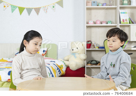 sulking Asian boy and girl 76400684
