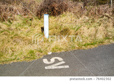 A SV, Stop Valve for water, sign in rural Ireland - County Donegal A SV, Stop Valve for water, sign in rural Ireland - County Donegal 76402302