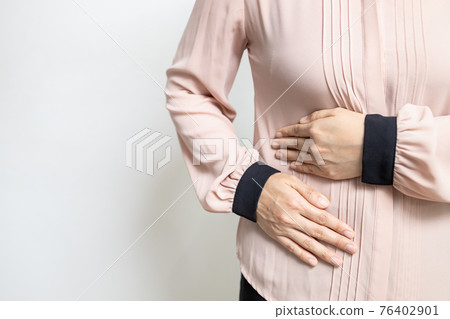 Asian woman patient with abdominal pain on right side belly,painful in abdomen,irritable bowel disease,lady girl holds under the ribs,stomach ache,cirrhosis of the liver disease,liver cancer concept 76402901