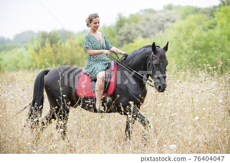 riding girl and horse riding girl and horse 76404047