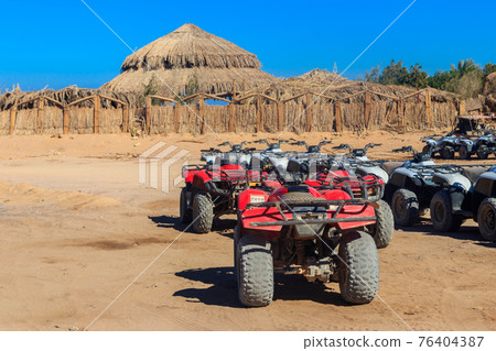 ATV quad bikes for safari trips in Arabian desert, Egypt ATV quad bikes for safari trips in Arabian desert, Egypt 76404387