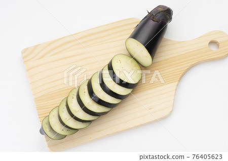 Eggplant cut into small pieces 76405623