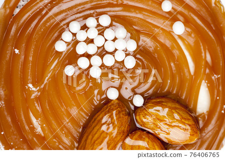 tartlet with milk cheese filling and lots of salted caramel 76406765
