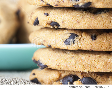 mixed oatmeal and wheat flour cookies close up 76407296