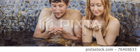 BANNER, LONG FORMAT Couple at spa relaxing in round outdoor fragrant herbal bath, organic skin care, luxury spa hotel, lifestyle photo BANNER, LONG FORMAT Couple at spa relaxing in round outdoor fragrant herbal bath, organic skin care, luxury spa hotel, lifestyle photo 76408633