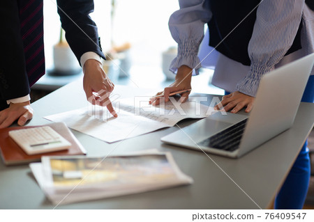 Hands of working men and women 76409547