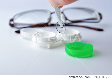 Contact lens and case. 76410122