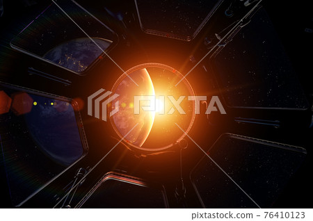 Earth and Sun from international space station window.  76410123