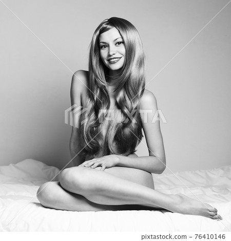 Sexy young woman with blonde hairs 76410146