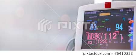 Electro blood pressure monitoring device In operating room hospital closeup wide background Electro blood pressure monitoring device In operating room hospital closeup wide background 76410338