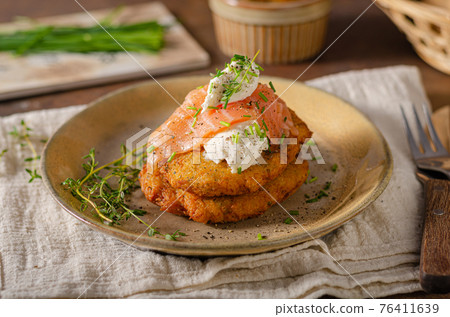 Delicious latkes with salmon Delicious latkes with salmon 76411639