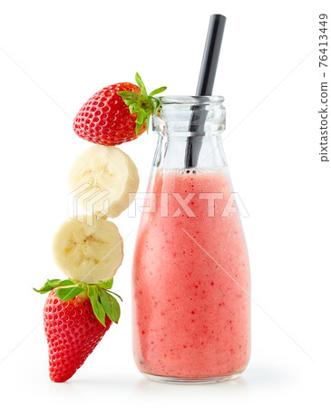 bottle of banana and strawberry smoothie 76413449
