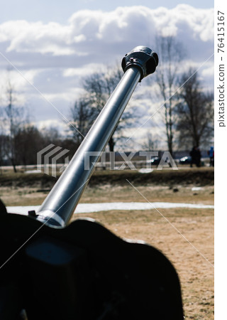 View of the russian cannons and howitzers in a park. Military museum outdoors 76415167