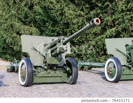 View of the russian cannons and howitzers in a park. Military museum outdoors 76415171
