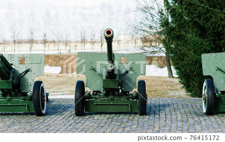 View of the russian cannons and howitzers in a park. Military museum outdoors 76415172