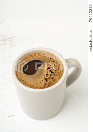 A cup of Turkish coffee on the table 76415836
