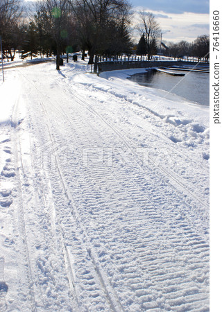 Fresh Snowmobile Tracks 76416660