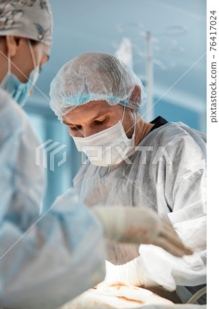 A team of surgeons is fighting for life, for a real operation, for real emotions. The intensive care team is fighting for the life of the patient. Saving life, the struggle for life 76417024