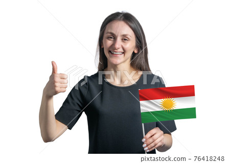 Happy young white woman holding flag of Kurdistan and shows the class by hand isolated on a white background Happy young white woman holding flag of Kurdistan and shows the class by hand isolated on a white background 76418248