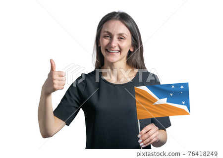 Happy young white woman holding flag of Argentine Antarctica and shows the class by hand isolated on a white background Happy young white woman holding flag of Argentine Antarctica and shows the class by hand isolated on a white background 76418249