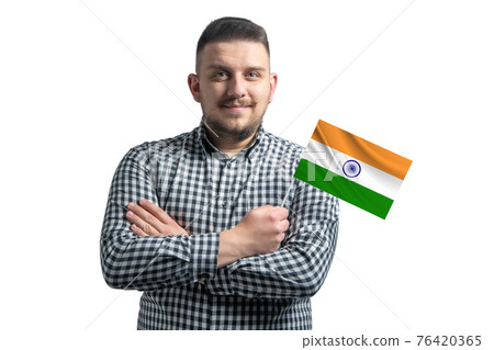 White guy holding a flag of India smiling confident with crossed arms isolated on a white background White guy holding a flag of India smiling confident with crossed arms isolated on a white background 76420365