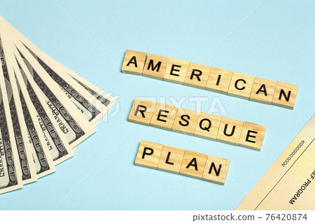 USA dollars background. American rescue plan, USA relief program, stimulus check and Act of 2021 concept. Money, business, profit and livelihood idea USA dollars background. American rescue plan, USA relief program, stimulus check and Act of 2021 concept. Money, business, profit and livelihood idea 76420874
