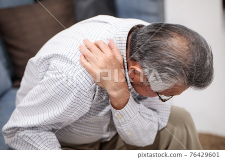 Senior man suffering from stiff neck Senior man suffering from stiff neck 76429601