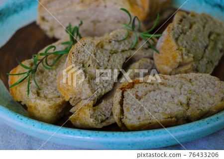 View of freshly baked homemade bread from the oven. 76433206