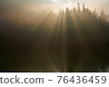 Orange-colored light beam 76436459