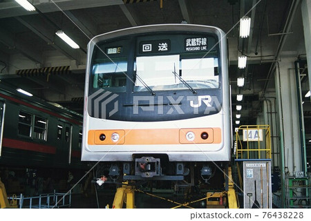 205 series electric train under inspection at the rolling stock factory 76438228